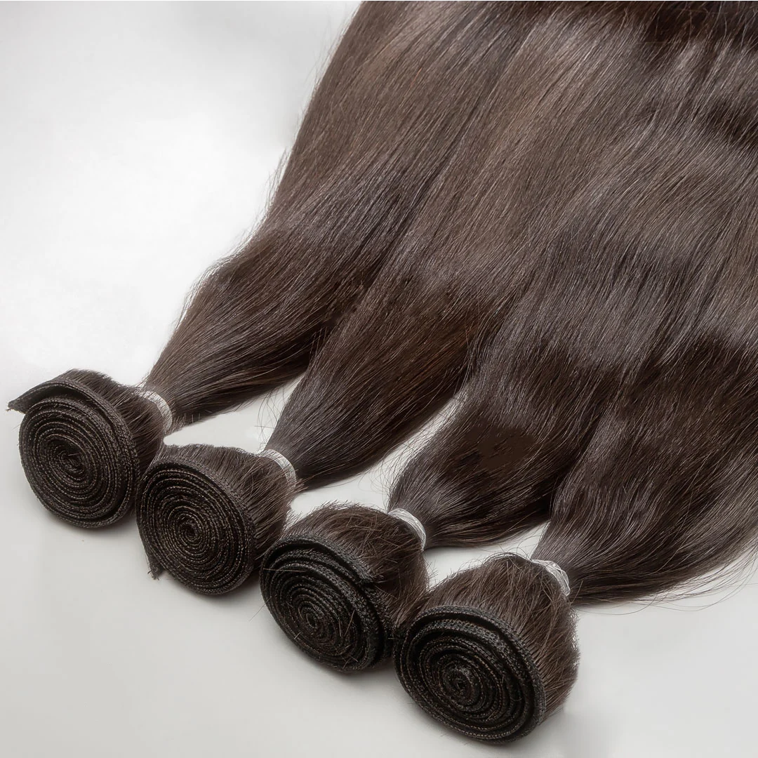A collection of brown weft hair extensions displayed on a white background.