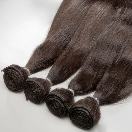 A collection of brown weft hair extensions displayed on a white background.