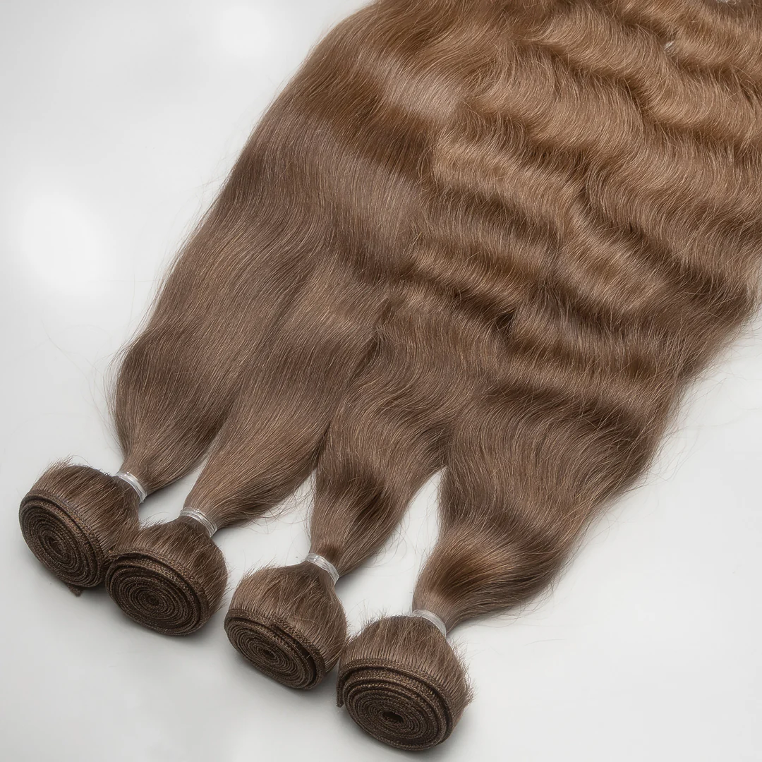 A set of ash light blonde weft hair extensions displayed on a white surface.